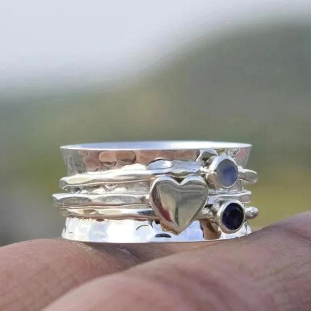 Elegant Roterande Hjärt Ring i Silver